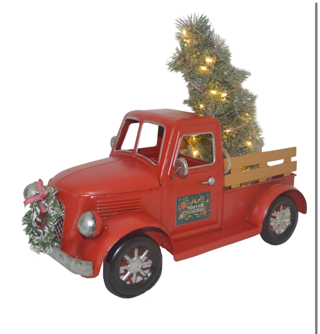 Red metal truck with light up tree